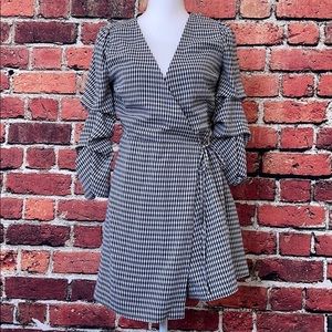 Black and white belted ruffle balloon sleeve dress